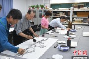 双龙戏凤两岸艺术家在安徽“共绘一幅画”